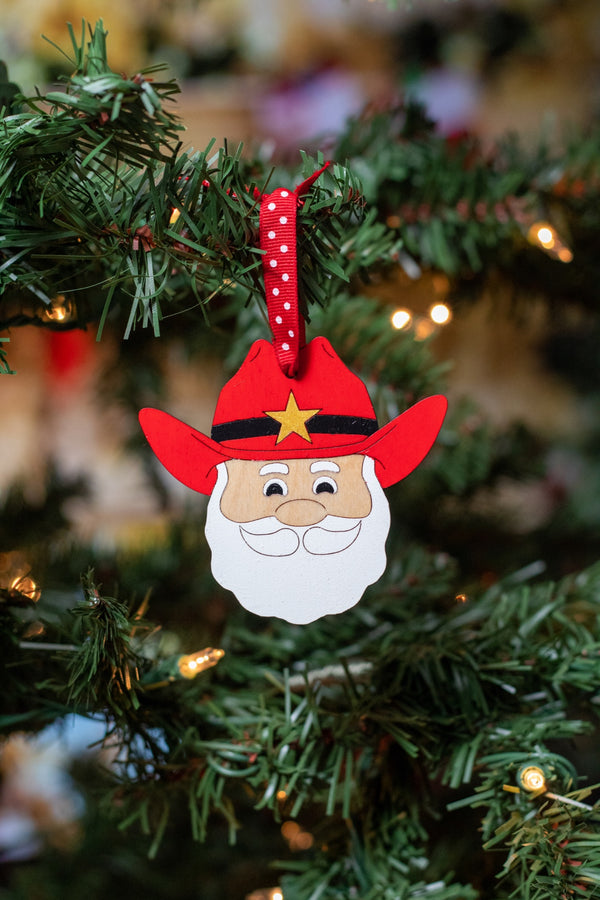 611fc05e3c4ce80992caae23_cowboy-santa-ornament_1753037786468.jpg