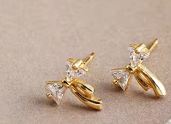 Cz gold bow studs  - 2