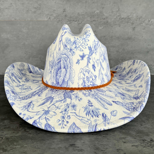 611fc05e3c4ce80992caae23_blue-chinoiserie-ivory-cattleman-cowboy-front_1776441449914.jpg