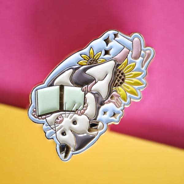 611fc05e3c4ce80992caae23_book-opossum-pin-2_1790869109709.jpg