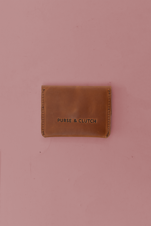 611fc05e3c4ce80992caae23_card-carrier-brown-back_1785430944252.png