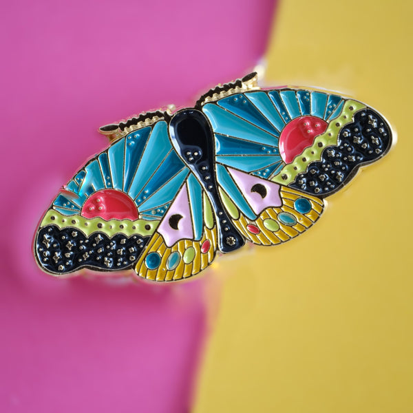 611fc05e3c4ce80992caae23_cosmic-moth-pin-3_1790814915676.jpg