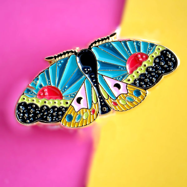 611fc05e3c4ce80992caae23_cosmic-moth-pin-3_1790866060044.jpg