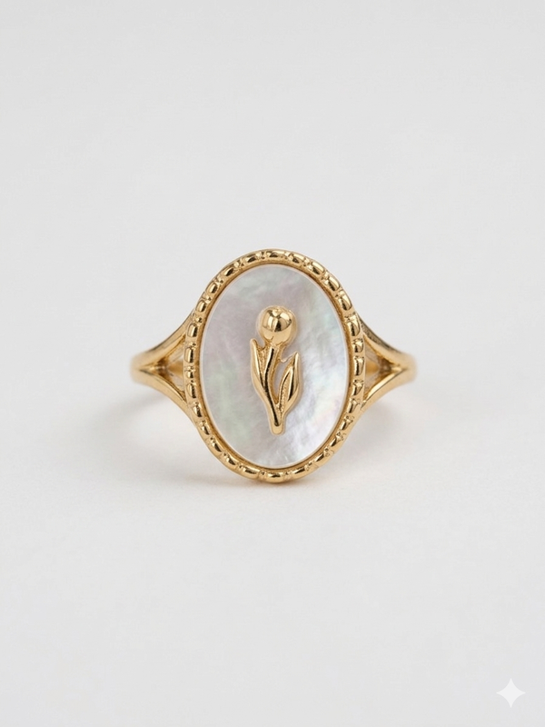 611fc05e3c4ce80992caae23_gold-ring-with-a-golden-flower-set-in-pearl-oval-with-studded-design_1777396863433.png