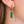 Load image into Gallery viewer, 611fc05e3c4ce80992caae23_green-stone-charm-dangle-huggies-model_1791497127509.png
