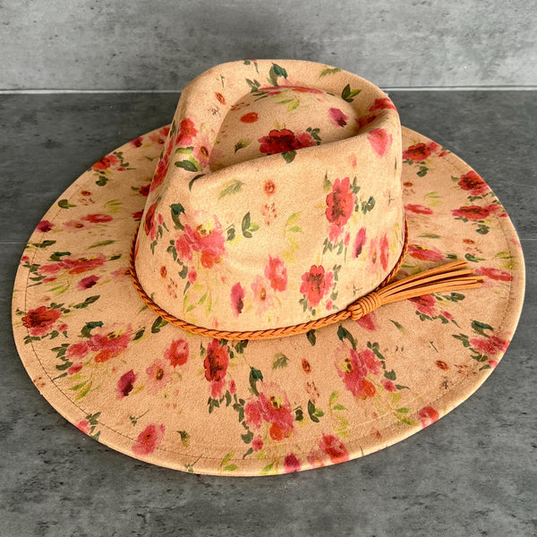 611fc05e3c4ce80992caae23_red-roses-tan-teardrop-front_1786551255330.jpg