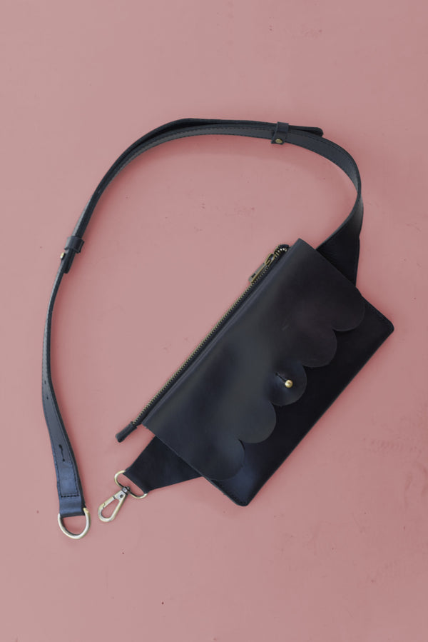 611fc05e3c4ce80992caae23_scallop-sling-bag-black_1785430390043.png