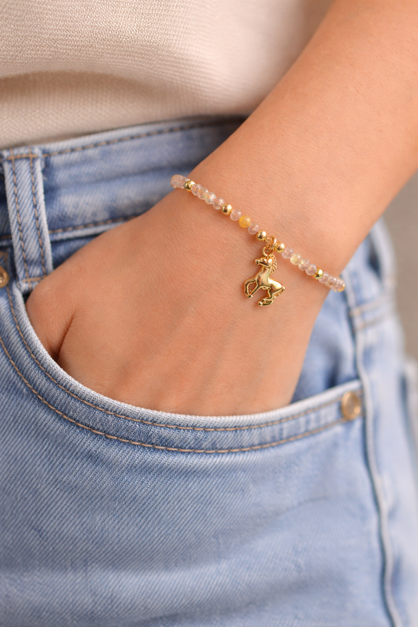 611fc05e3c4ce80992caae23_year-of-the-horse-bracelet-topaz-13_1771023024637.png
