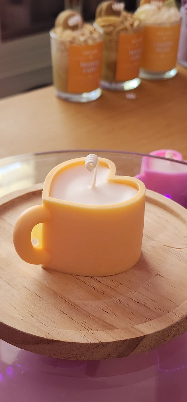 611fc05e3c4ce80992caae23_yellow-love-cup-candle_1783731283518.jpg